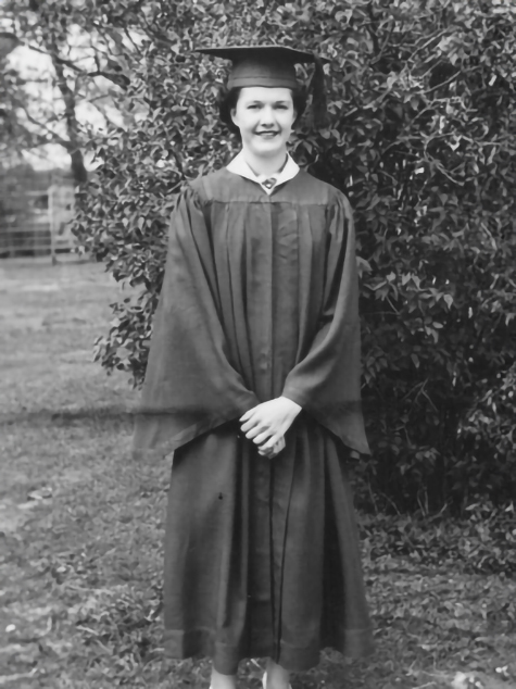 Marilyn's past graduation photo outside, with a bright, cheery smile.