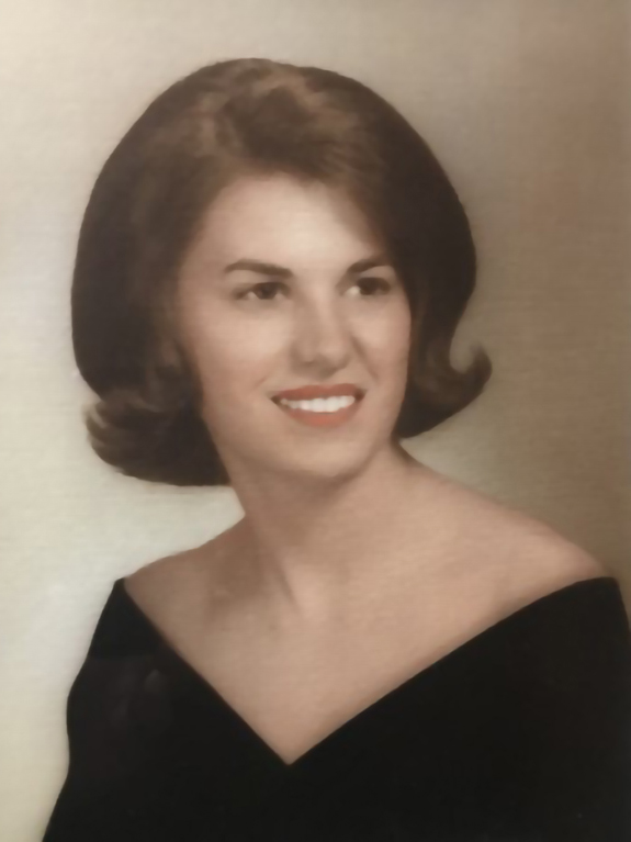 Vintage image of Elaine wearing a black dress.