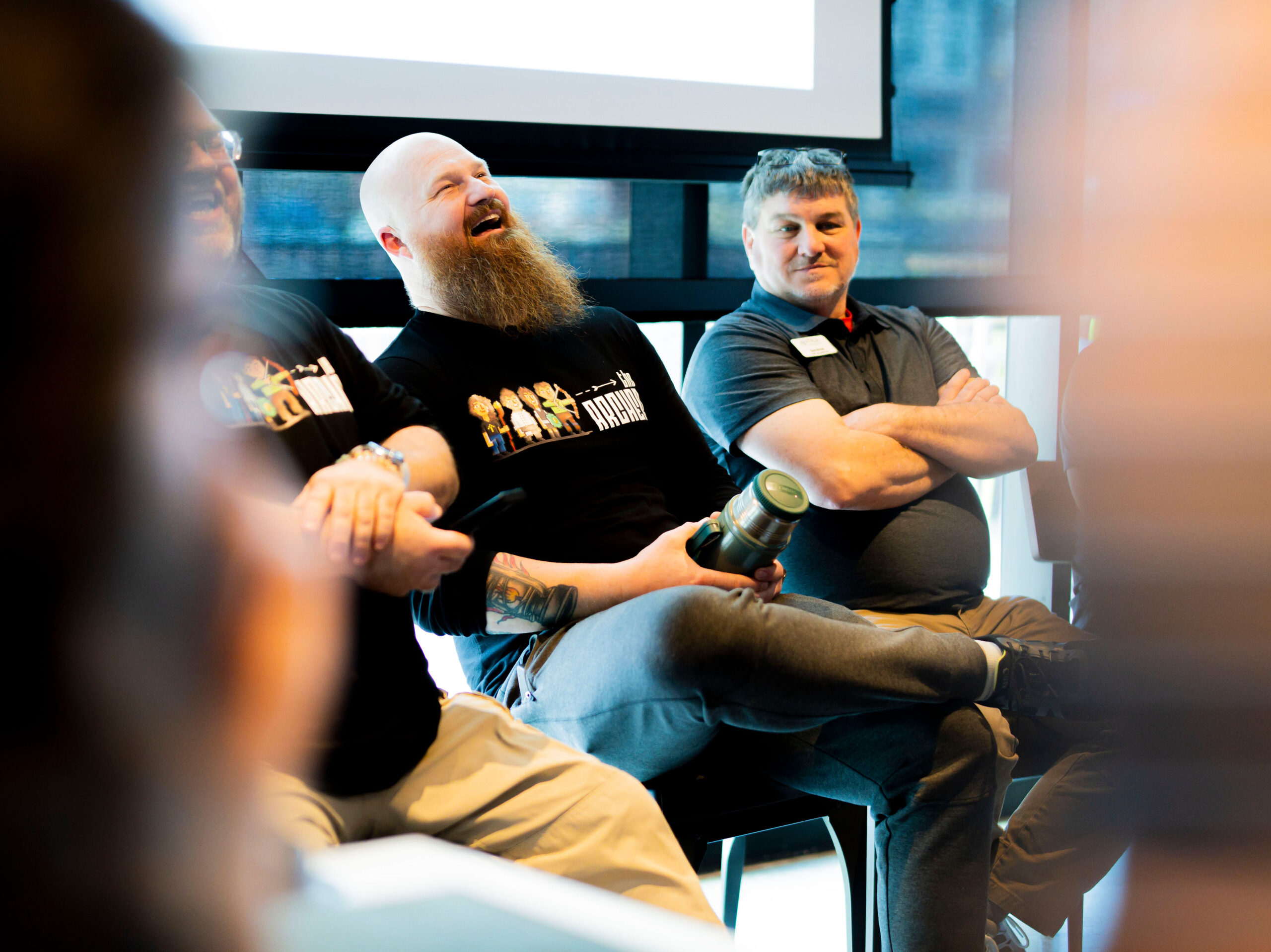 Members of Arrow Senior Living's Plant Ops teams smile and laugh during the 2025 summit.